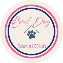 A circle with the words bad dog social club written in it.